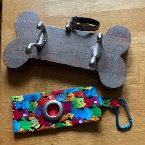 Wall mount for doggie items, small Burberry collar, bag to hold doggie poop bags